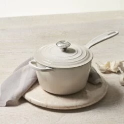 Le Creuset 2.25 Qt. Signature Enameled Cast Iron Saucepan With Stainless Steel Knob | Meringue White 6 Le Creuset 2.25 Qt. Signature Enameled Cast Iron Saucepan With Stainless Steel Knob | Meringue White -Cooking Master mer1 1