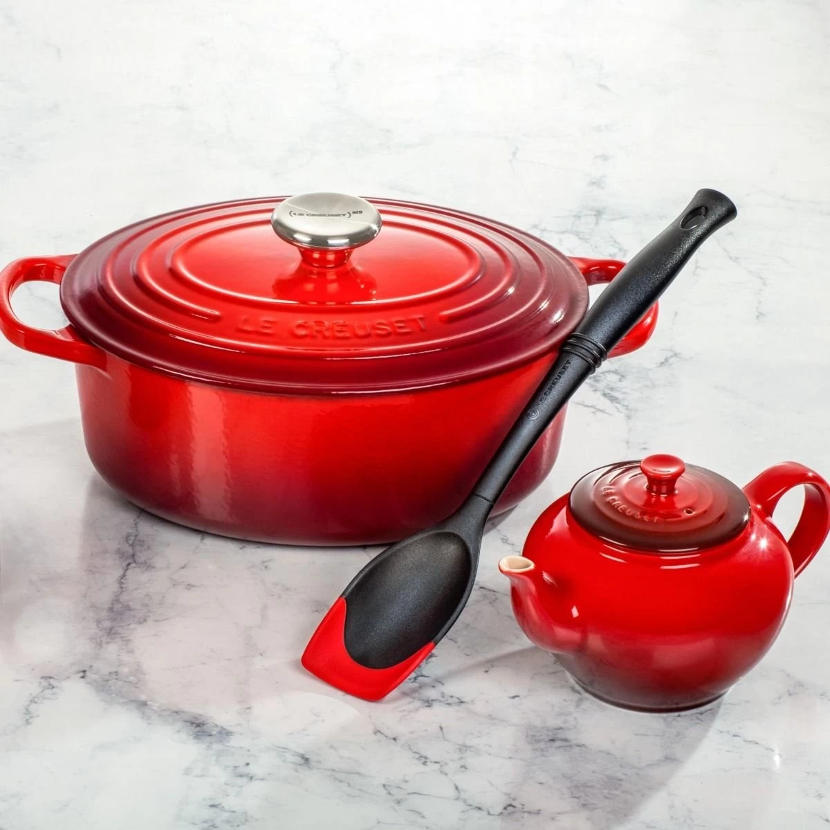 Le Creuset Revolution® Bi-Material Sauté Spoon | Cerise/Cherry Red 2 Le Creuset Revolution® Bi-Material Sauté Spoon | Cerise/Cherry Red - Image 2