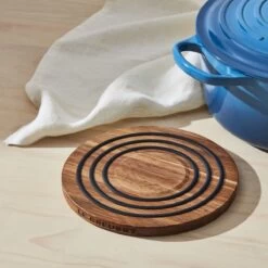Le Creuset 8" Magnetic Wooden Trivet With Black Silicone Rings | Acacia Wood -Cooking Master rs16173 le creuset magnetictrivetdetatched ret
